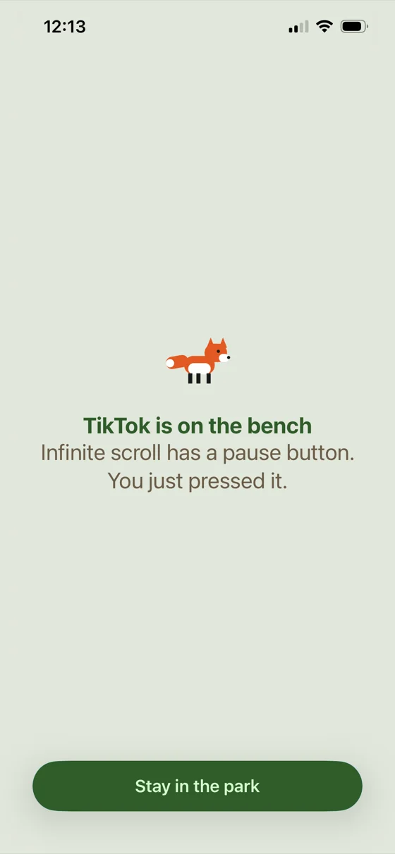 Parkbench block screen for TikTok: a fox with “Infinite scroll has a pause button. You just pressed it.”